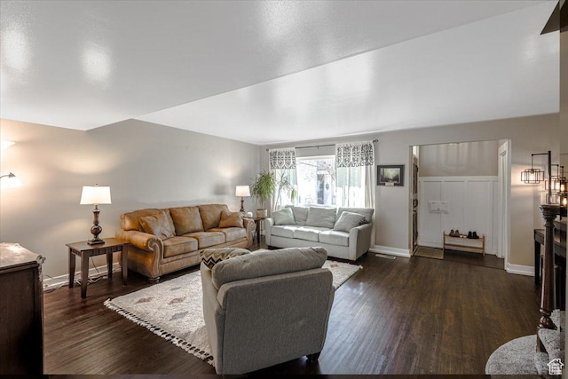 4879 S 1690 E, Holladay, UT 84117 - living room with dark wood-type flooring and baseboards