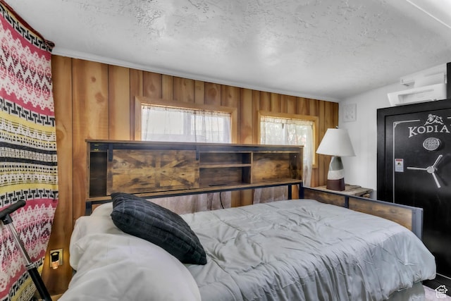 586 W 300 N, Fountain Green, UT 84632 - bedroom featuring a textured ceiling and wood walls