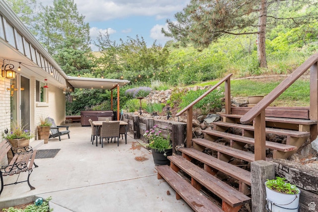 2582 Jacqueline Dr E, Ogden, UT 84403 - view of patio with a hot tub and stairway