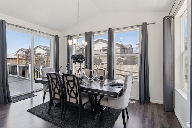 5488 W Tower Arch Ln, Herriman, UT 84096 - dining space with vaulted ceiling, a chandelier, and wood finished floors