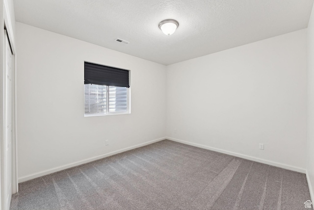 5488 W Tower Arch Ln, Herriman, UT 84096 - unfurnished room featuring carpet and a textured ceiling