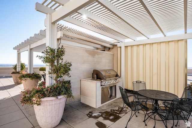 48 W 300 S Unit 903, Salt Lake City, UT 84101 - view of patio with an outdoor kitchen, a pergola, and outdoor dining area