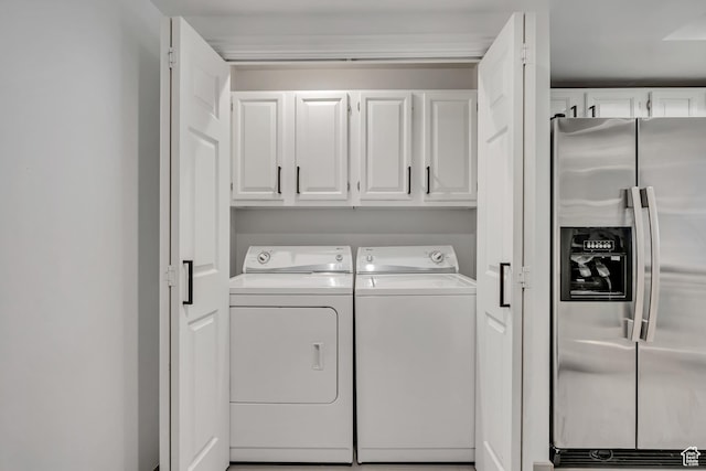 48 W 300 S Unit 903, Salt Lake City, UT 84101 - washroom featuring washing machine and dryer and cabinet space