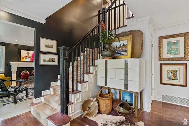 1074 E Raymond Rd, Fruit Heights, UT 84037 - stairway with ornamental molding and wood finished floors
