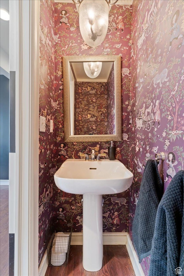 1074 E Raymond Rd, Fruit Heights, UT 84037 - bathroom featuring wood finished floors and wallpapered walls