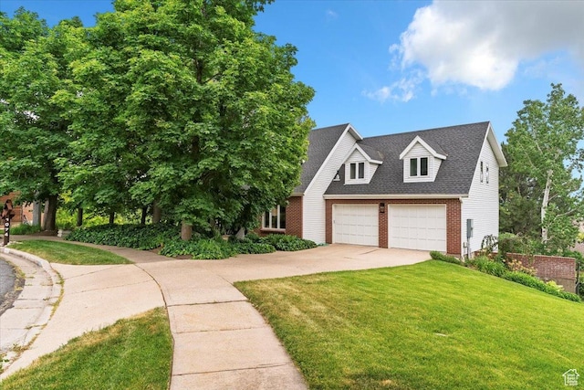 1074 E Raymond Rd, Fruit Heights, UT 84037 - view of front of property with a front yard, brick siding, concrete driveway, and roof with shingles