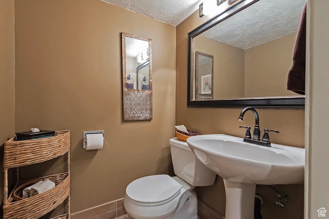 8216 S Scandia Way, Sandy, UT 84093 - bathroom featuring a textured ceiling and tile patterned flooring