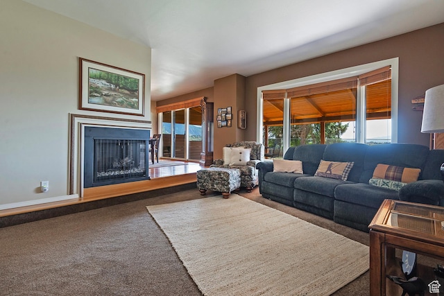 8216 S Scandia Way, Sandy, UT 84093 - carpeted living area featuring a fireplace with raised hearth