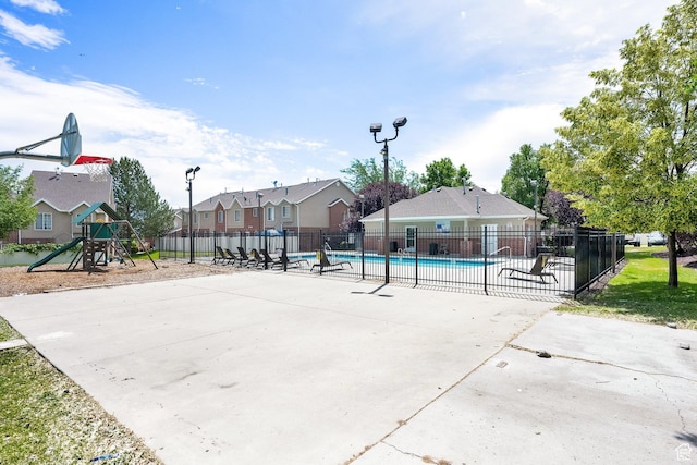 3951 W Sage Blossom Way S, Jordan, UT 84009 - view of basketball court featuring a community pool and a residential view