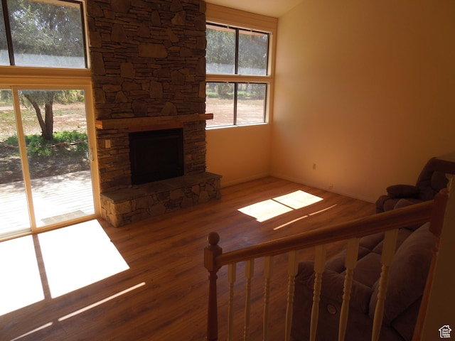 426 N Amber Ln N Unit 426, Castle Valley, UT 84532 - living area featuring a fireplace, wood finished floors, and healthy amount of natural light