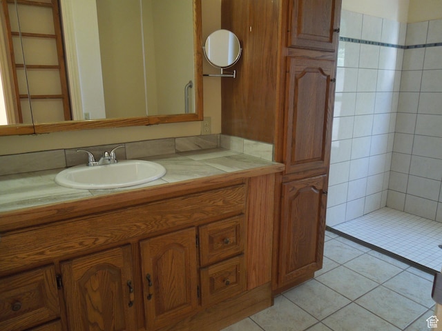 426 N Amber Ln N Unit 426, Castle Valley, UT 84532 - bathroom featuring vanity, tile patterned floors, and a tile shower