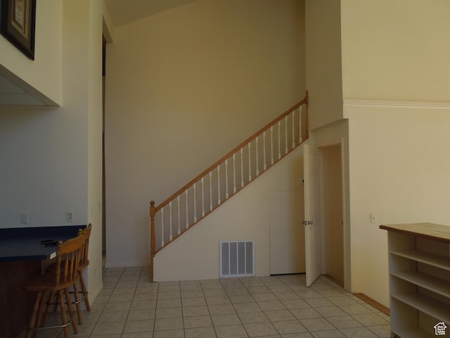 426 N Amber Ln N Unit 426, Castle Valley, UT 84532 - unfurnished living room with stairway and light tile patterned floors