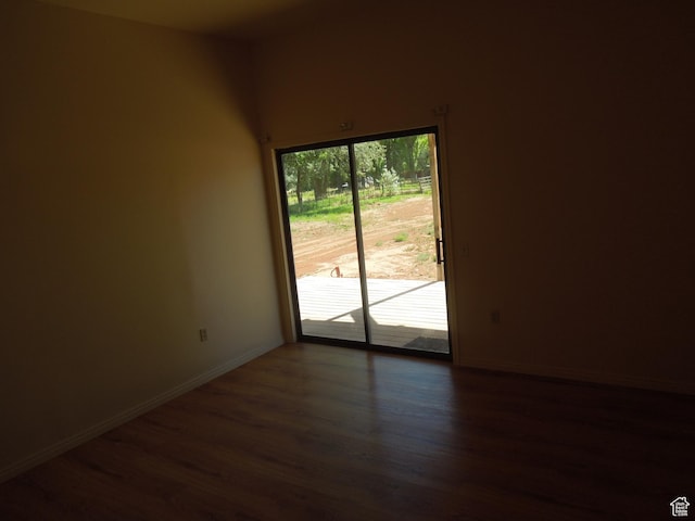 426 N Amber Ln N Unit 426, Castle Valley, UT 84532 - empty room featuring dark wood-type flooring and baseboards