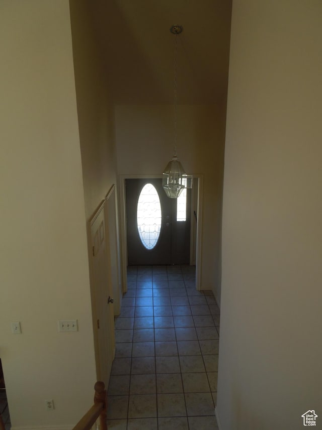 426 N Amber Ln N Unit 426, Castle Valley, UT 84532 - entryway featuring a chandelier, light tile patterned floors, and a towering ceiling