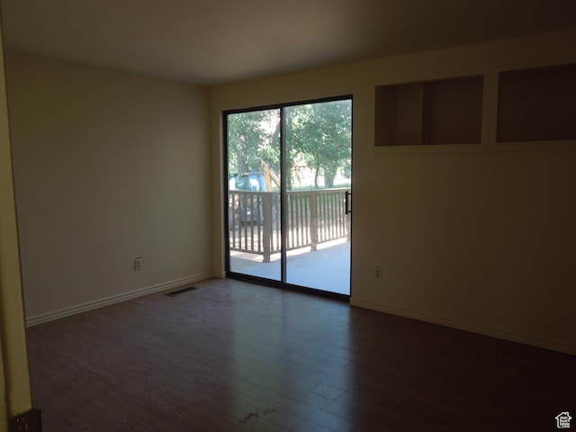 426 N Amber Ln N Unit 426, Castle Valley, UT 84532 - spare room with dark wood-type flooring and baseboards