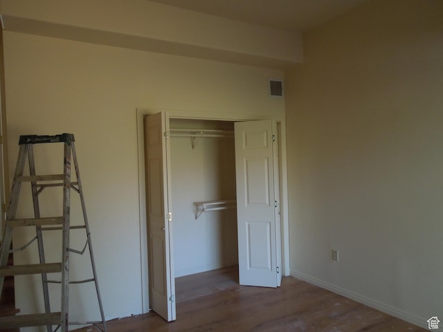 426 N Amber Ln N Unit 426, Castle Valley, UT 84532 - unfurnished bedroom featuring wood finished floors and a closet