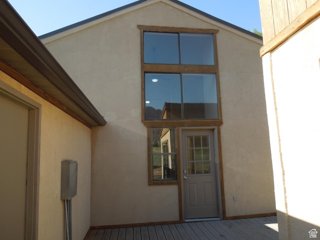 426 N Amber Ln N Unit 426, Castle Valley, UT 84532 - doorway to property featuring stucco siding and a deck