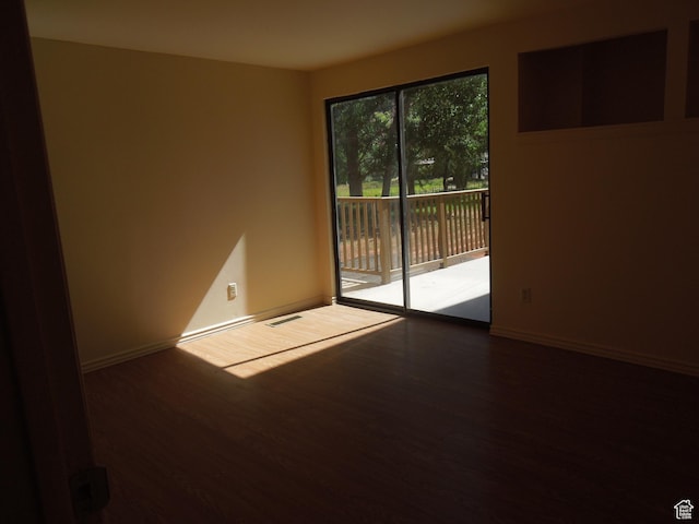 426 N Amber Ln N Unit 426, Castle Valley, UT 84532 - unfurnished room with wood finished floors and baseboards