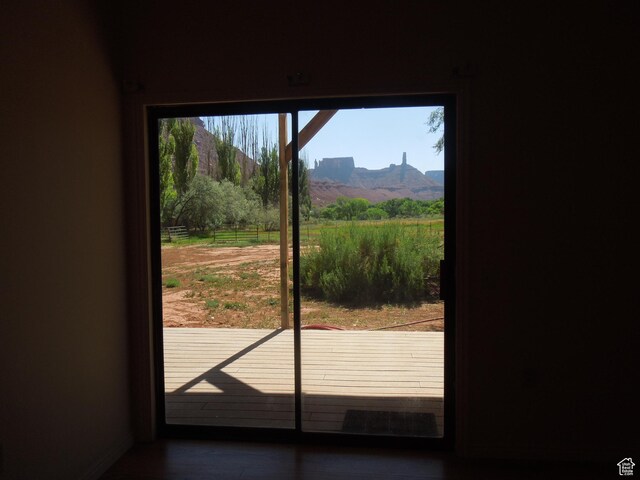 426 N Amber Ln N Unit 426, Castle Valley, UT 84532 - doorway to outside with a mountain view and baseboards