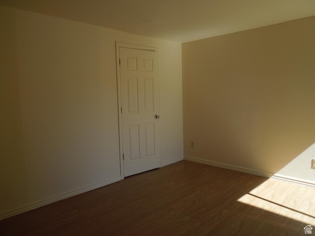 426 N Amber Ln N Unit 426, Castle Valley, UT 84532 - unfurnished room featuring dark wood-style floors and baseboards