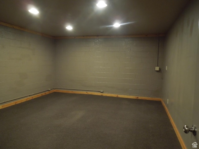 426 N Amber Ln N Unit 426, Castle Valley, UT 84532 - carpeted empty room featuring concrete block wall