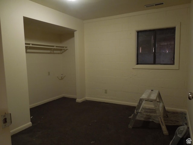 426 N Amber Ln N Unit 426, Castle Valley, UT 84532 - unfurnished bedroom featuring baseboards and concrete block wall