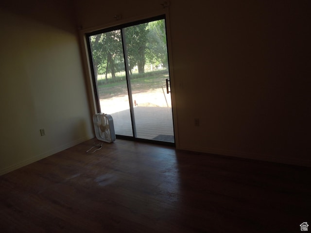 426 N Amber Ln N Unit 426, Castle Valley, UT 84532 - unfurnished room featuring dark wood-type flooring and baseboards