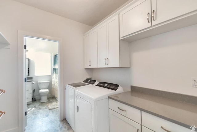 248 W Chukar Cir Unit 18, Garden City, UT 84028 - laundry room with cabinet space and washer and dryer