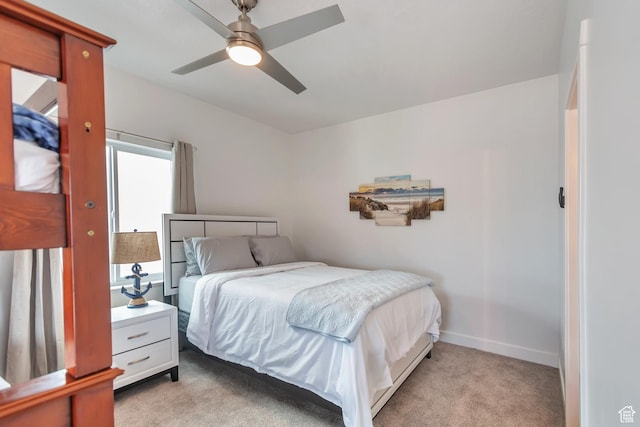 248 W Chukar Cir Unit 18, Garden City, UT 84028 - bedroom featuring light colored carpet and a ceiling fan