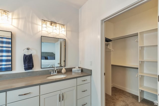 248 W Chukar Cir Unit 18, Garden City, UT 84028 - ensuite bathroom with vanity and a spacious closet