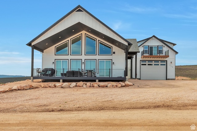 248 W Chukar Cir Unit 18, Garden City, UT 84028 - view of front of house with driveway and an attached garage