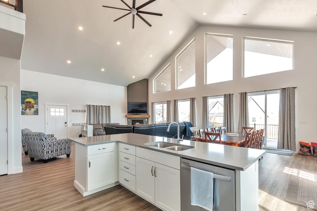 248 W Chukar Cir Unit 18, Garden City, UT 84028 - kitchen featuring dishwasher, open floor plan, high vaulted ceiling, a ceiling fan, and light wood-type flooring