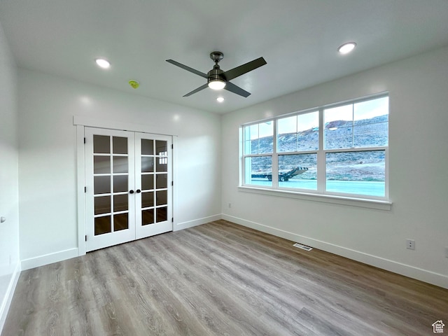 82 N 500 W, Gunnison, UT 84634 - spare room featuring french doors, wood finished floors, a ceiling fan, and recessed lighting