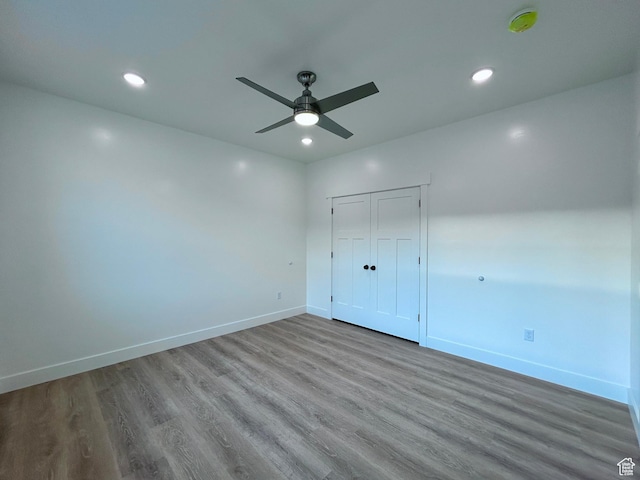 82 N 500 W, Gunnison, UT 84634 - unfurnished bedroom featuring wood finished floors, recessed lighting, a ceiling fan, and a closet