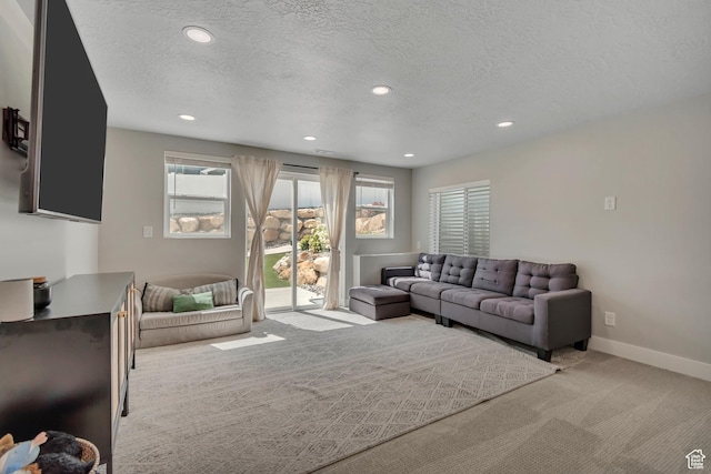 9757 N Aaron Ave E Unit 204, Eagle Mountain, UT 84005 - carpeted living room with recessed lighting and a textured ceiling