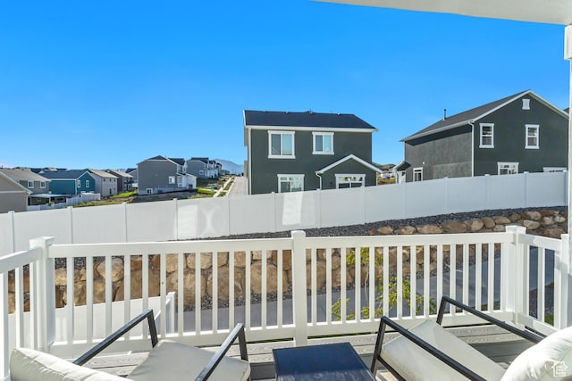 9757 N Aaron Ave E Unit 204, Eagle Mountain, UT 84005 - wooden terrace featuring a residential view and a fenced backyard