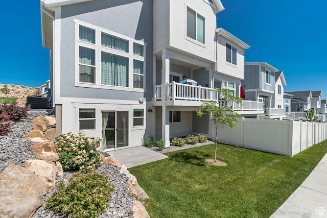 9757 N Aaron Ave E Unit 204, Eagle Mountain, UT 84005 - back of house with stucco siding and a residential view