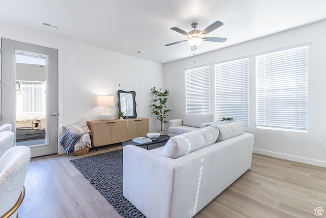 2741 N 2775 W Unit 125, Plain City, UT 84404 - living area featuring light wood finished floors and ceiling fan