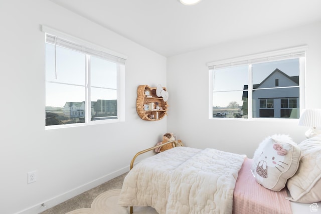 2741 N 2775 W Unit 125, Plain City, UT 84404 - carpeted bedroom with multiple windows