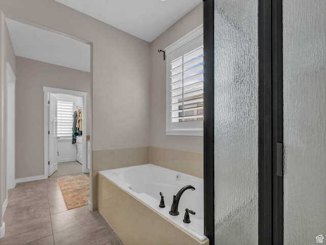 10298 S Otter Trail Dr, South Jordan, UT 84095 - full bathroom featuring a garden tub and tile patterned flooring