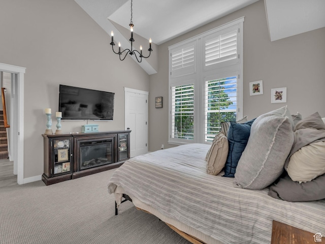 10298 S Otter Trail Dr, South Jordan, UT 84095 - carpeted bedroom with high vaulted ceiling, a chandelier, and a glass covered fireplace