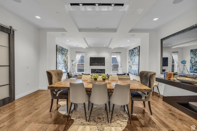 333 Main St Unit 10, Park City, UT 84060 - dining room with a fireplace, wood finished floors, beamed ceiling, and recessed lighting