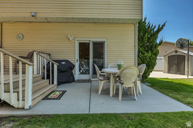 7305 S Autumn Meadow Cir W, West Jordan, UT 84084 - view of patio / terrace with a storage unit, area for grilling, and outdoor dining area