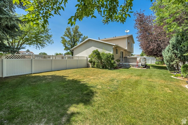 7305 S Autumn Meadow Cir W, West Jordan, UT 84084 - fenced backyard featuring a wooden deck