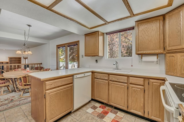 7305 S Autumn Meadow Cir W, West Jordan, UT 84084 - kitchen featuring white appliances, a peninsula, light countertops, decorative light fixtures, and a chandelier