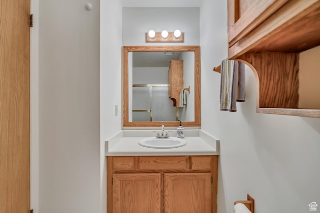 7305 S Autumn Meadow Cir W, West Jordan, UT 84084 - bathroom featuring vanity and a shower with door