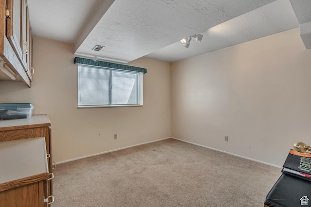 7305 S Autumn Meadow Cir W, West Jordan, UT 84084 - unfurnished living room with light colored carpet and a textured ceiling