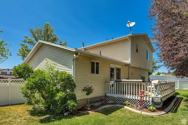 7305 S Autumn Meadow Cir W, West Jordan, UT 84084 - back of house featuring a wooden deck and a fenced backyard