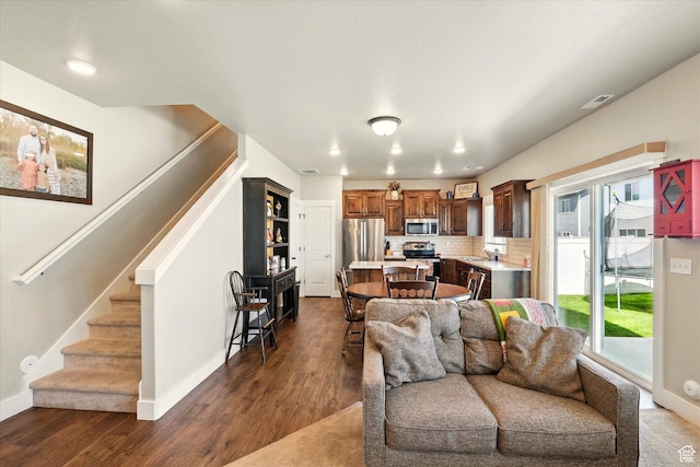 1469 W 2200 S, Wellsville, UT 84339 - living room with stairway, dark wood-style flooring, and recessed lighting