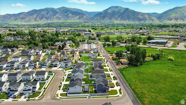 1469 W 2200 S, Wellsville, UT 84339 - aerial perspective of suburban area featuring a mountainous background